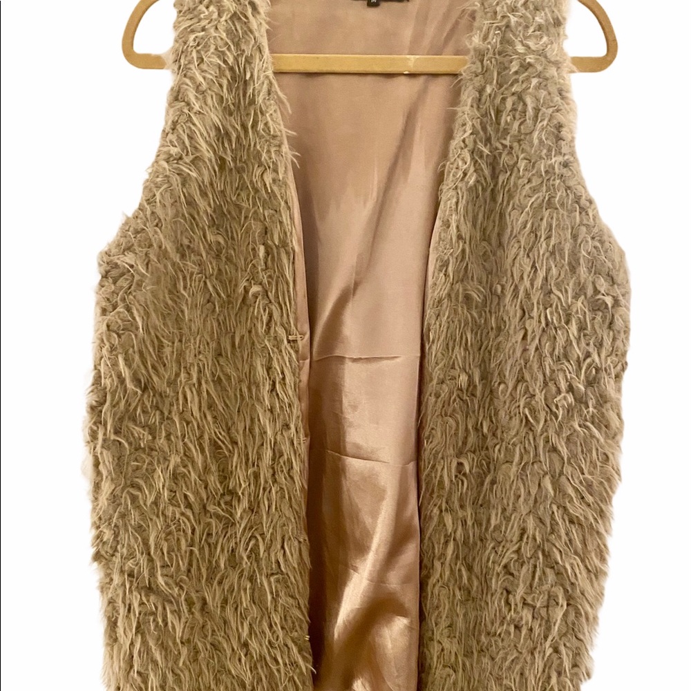 Cute faux fur tan vest!